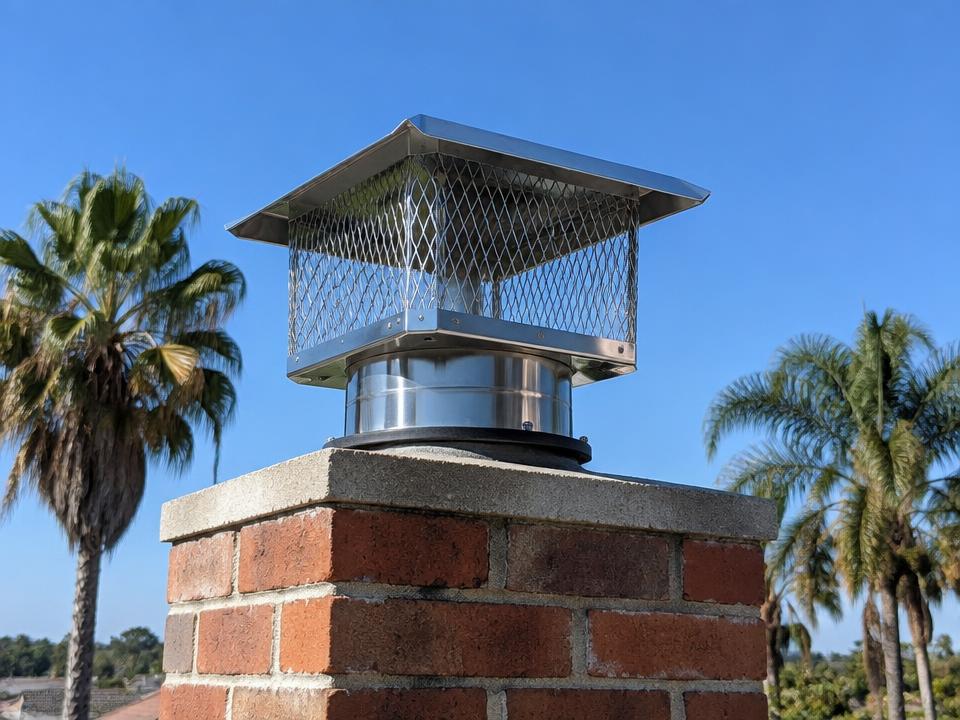 Stainless steel chimney cap installed on a Los Angeles home